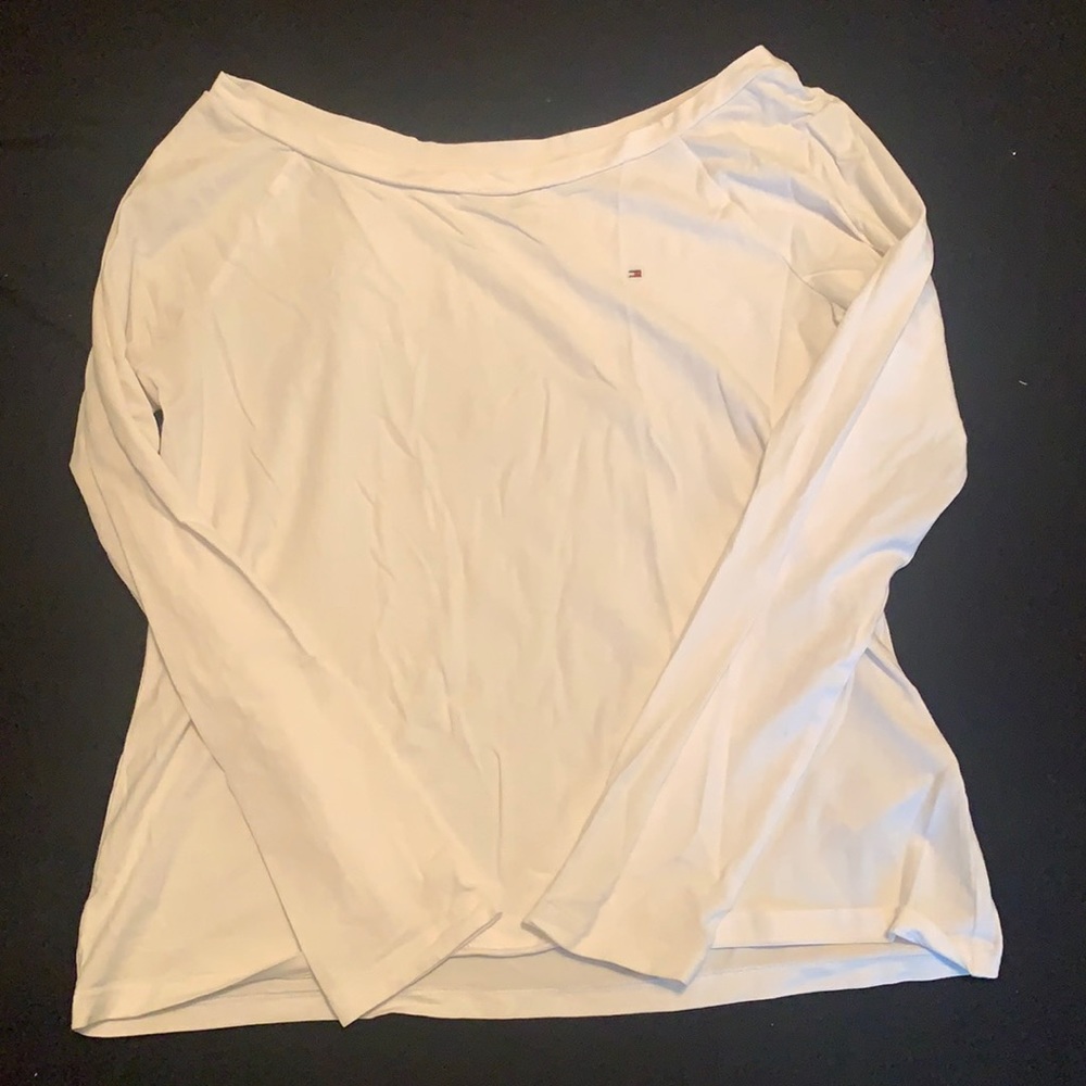 Size medium. Never worn. White three quarters length sleeve